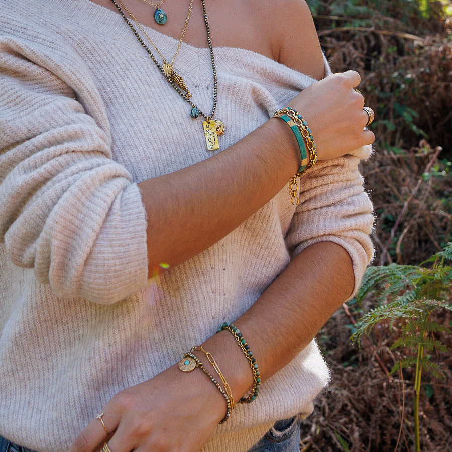 Bracelet hématite dorée et pendentif turquoise