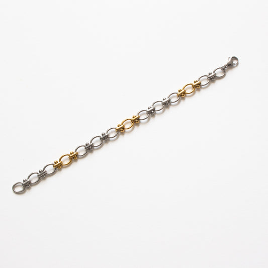 Bracelet mailles rondes argentées et dorées