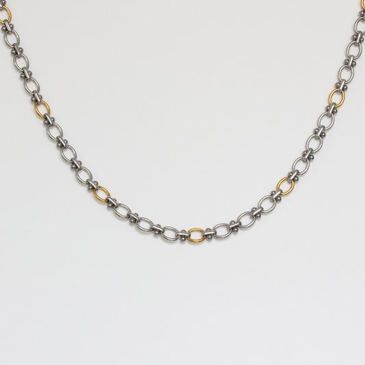 Collier mailles rondes argentées et dorées
