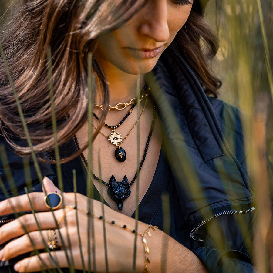 Collier perles onyx et pendentif oeil